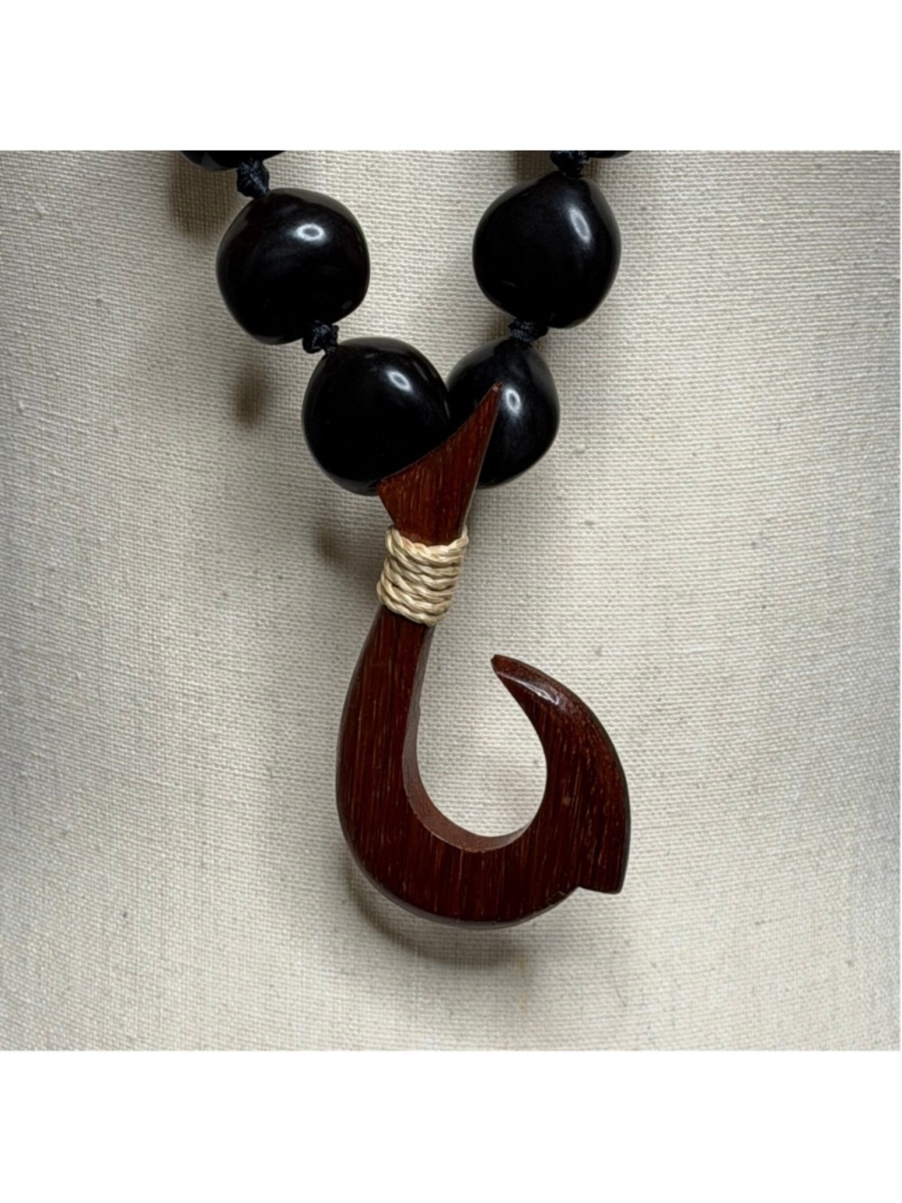 black kukui nut lei with a wooden fish hook pendant - Picture 2 of 4